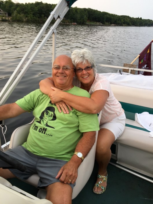 Sam & Gay on their pontoon boat.