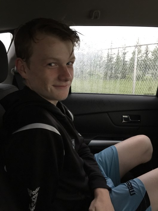 Zach is 14 and in 9th grade. That's the storm that prevented us from watching him play. So disappointed!