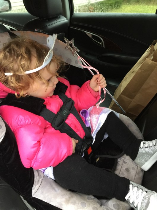 Wearing her Sophia dress with crown and wand.